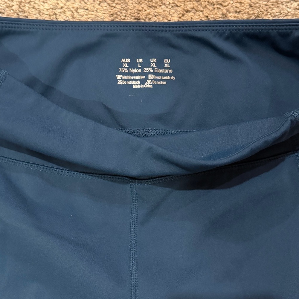 Dark Ocean Blue Capri Women's Leggings side pockets - Picture 4 of 7